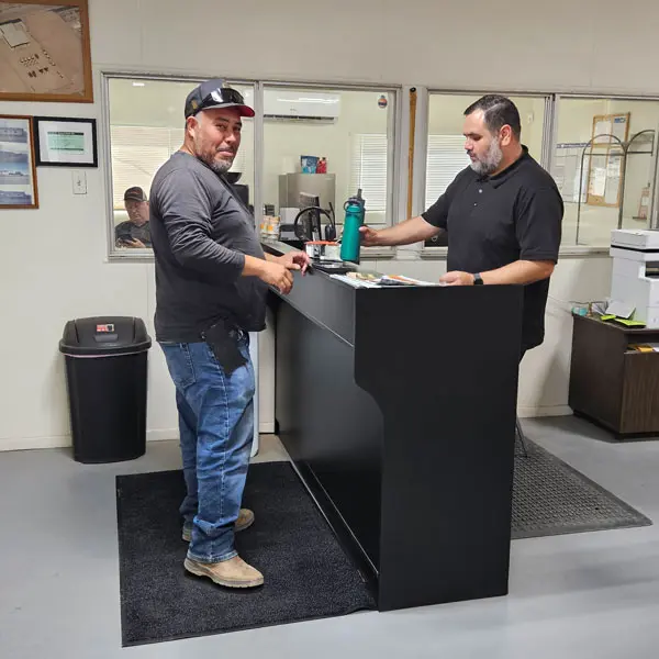 A customer placing an order at the Freeman Holtville store.