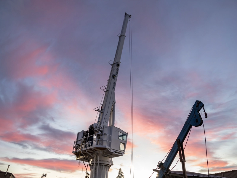 Telescopic Boom Crane on test stand at sunrise