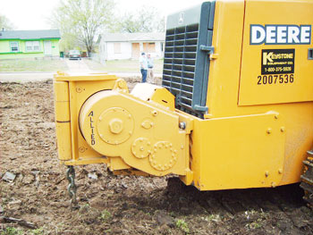 WH6G mounted on the 755C track loader.